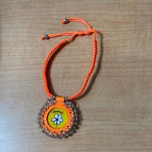 Orange Beaded Bracelet with Flower Charm
